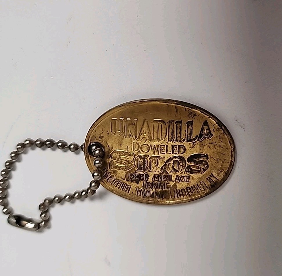1906 ANTIQUE UNADILLA SILOS NY FARM ADVERTISING PENDANT KEYCHAIN CHARM FOB TAG