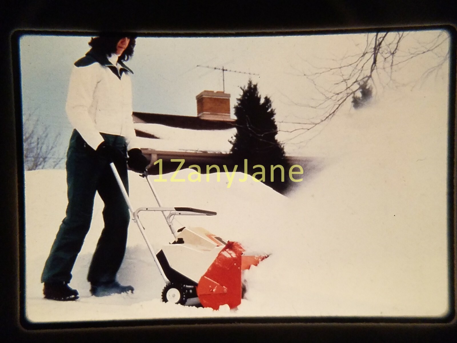AC2013 35mm Slide of an Allis-Chalmers from MEDIA ARCHIVES WOMAN SNOWBLOWER