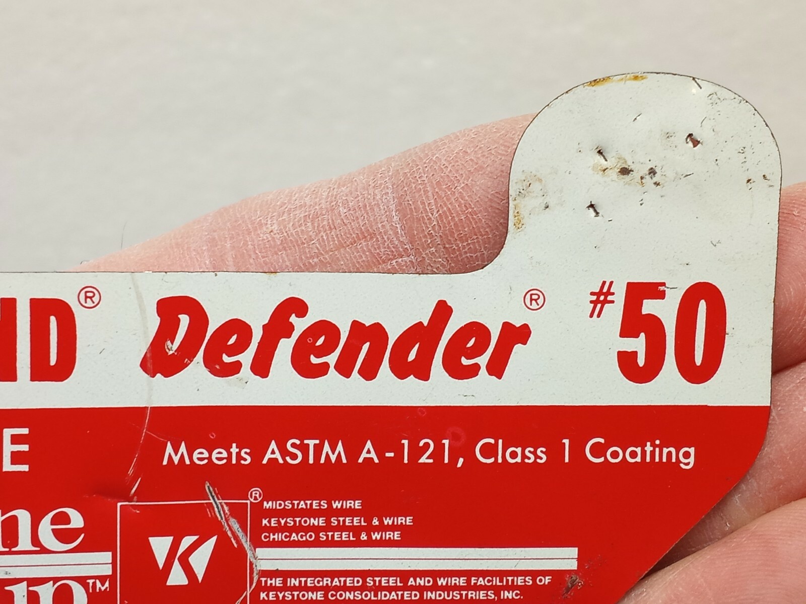 Vtg RED BRAND DEFENDER BARBED WIRE FENCE TIN METAL SIGN KEYSTONE GROUP USA
