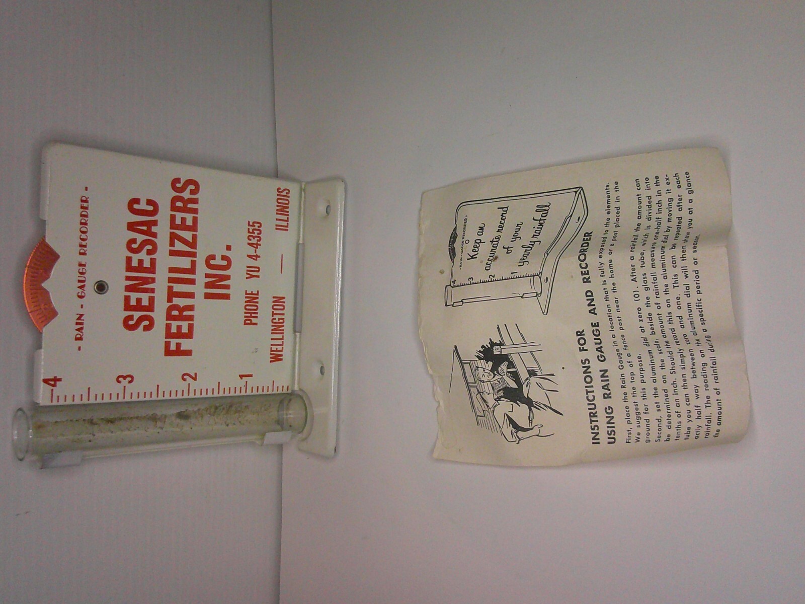 Metal outdoor advertising rain gauge w/ inst. Senesac Inc. Wellington, Ill. Z150