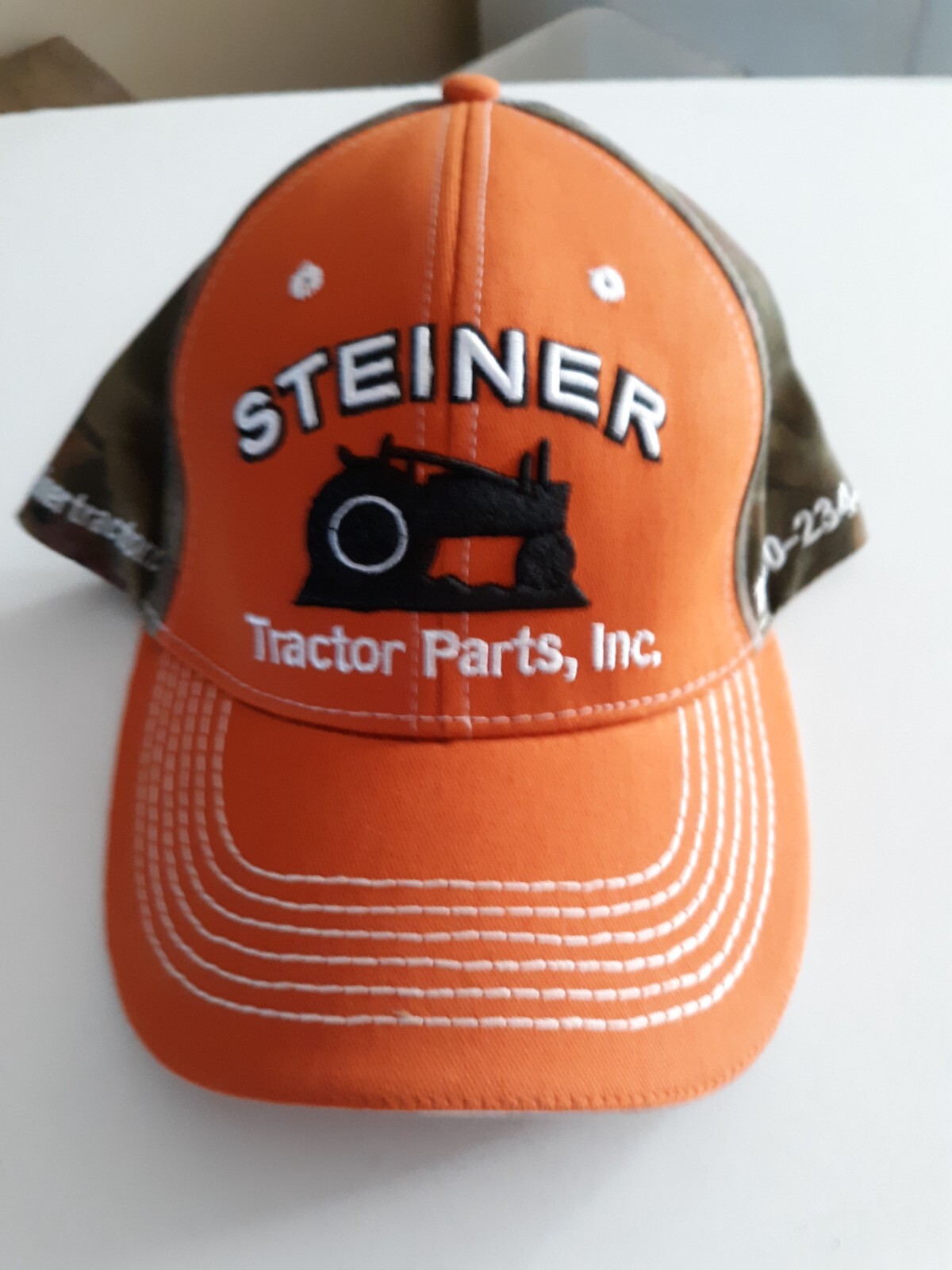 embroidered orange/brown Steiner Tractor Parts baseball cap hat…NEW