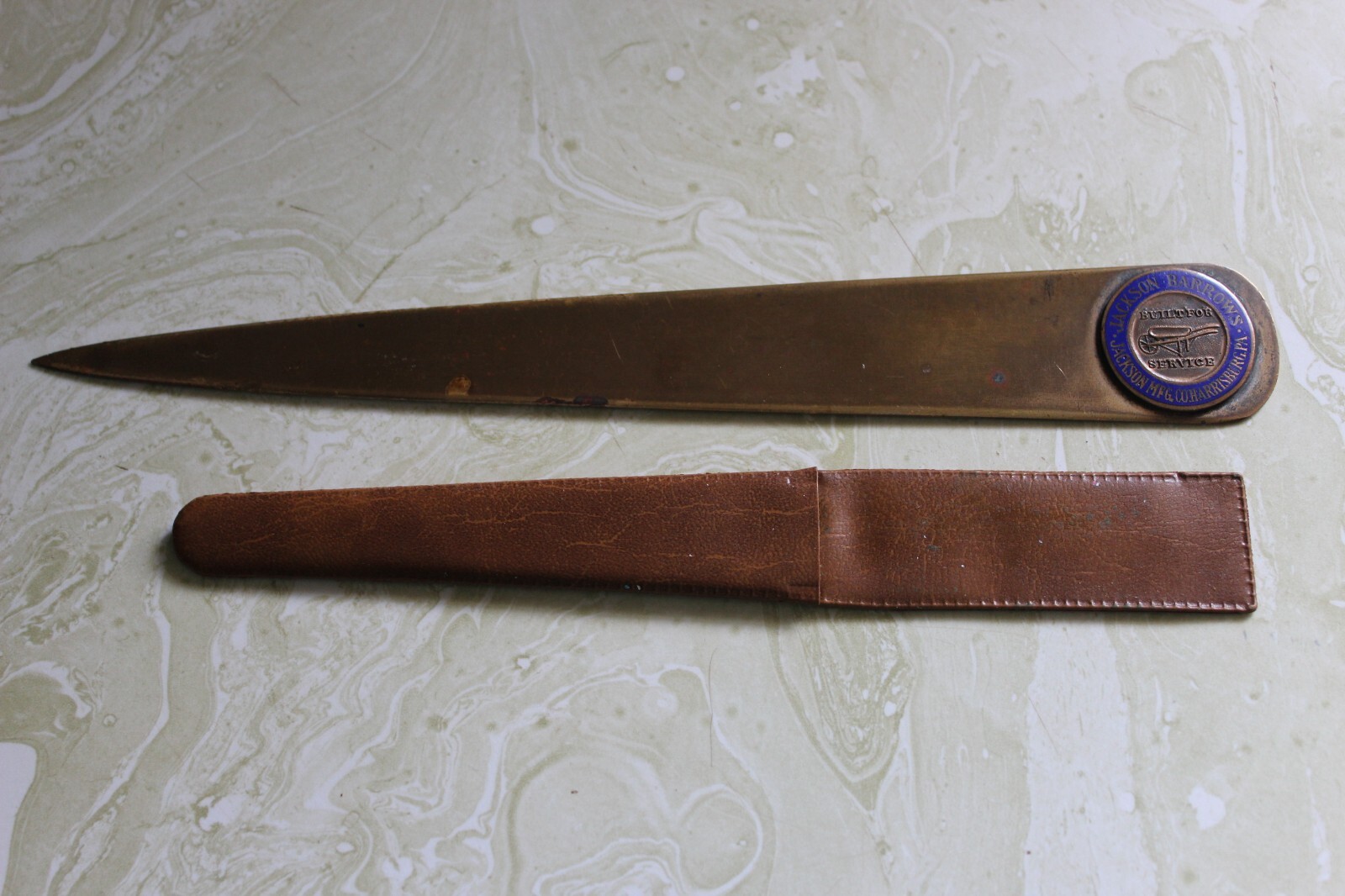 BRONZE LETTER OPENER FROM JACKSON BARROWS (WHEEL BARROWS) HARRISBURG, PA.