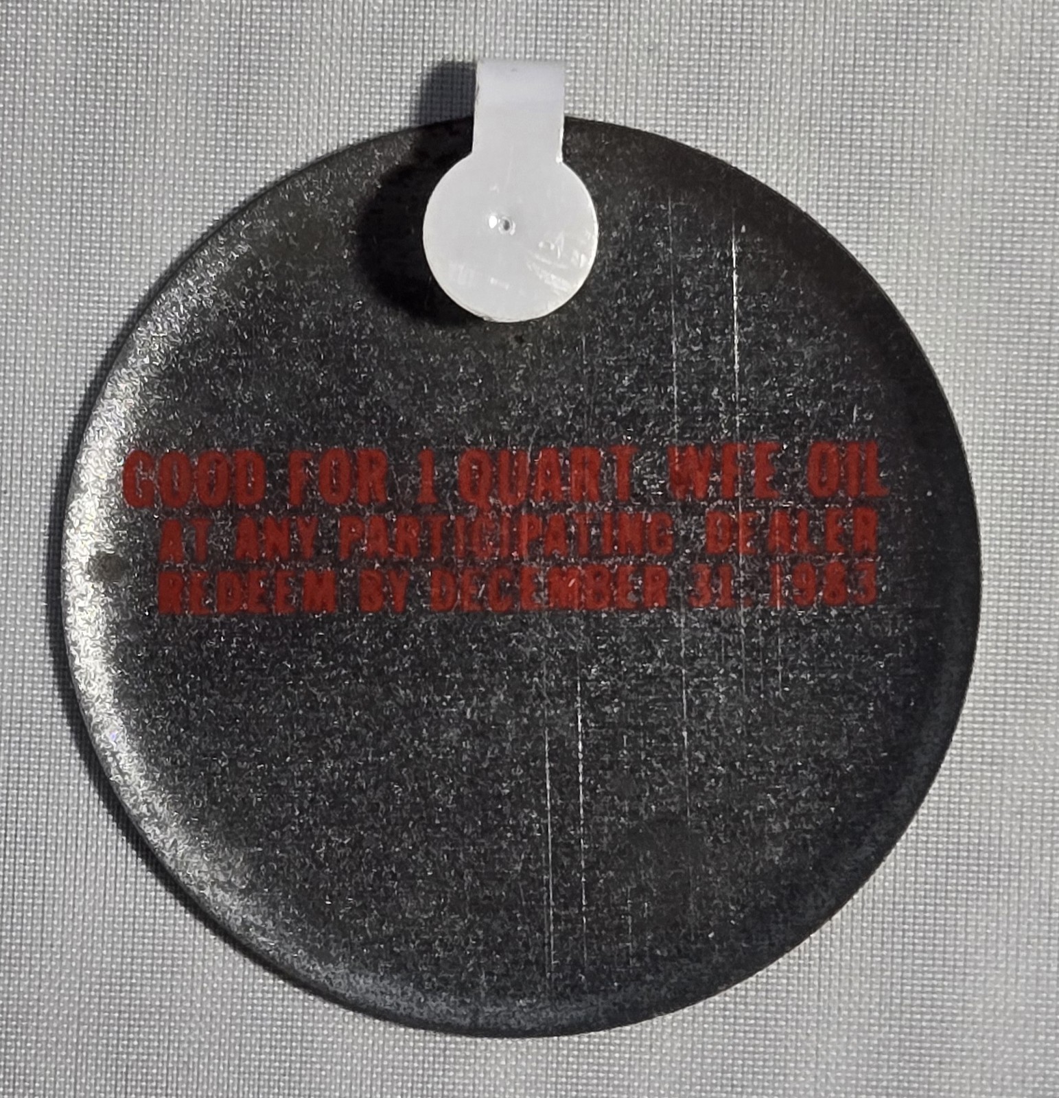 WHITE FARM EQUIPMENT 1983 PINBACK GOOD FOR 1 QUART OF WFE OIL
