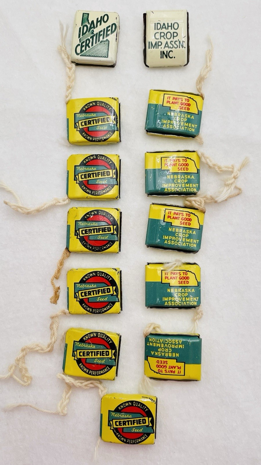 Lot 13 VTG Farm Metal Seed Bag Tag Clip NEBRASKA Crop Improvement Assoc & Idaho