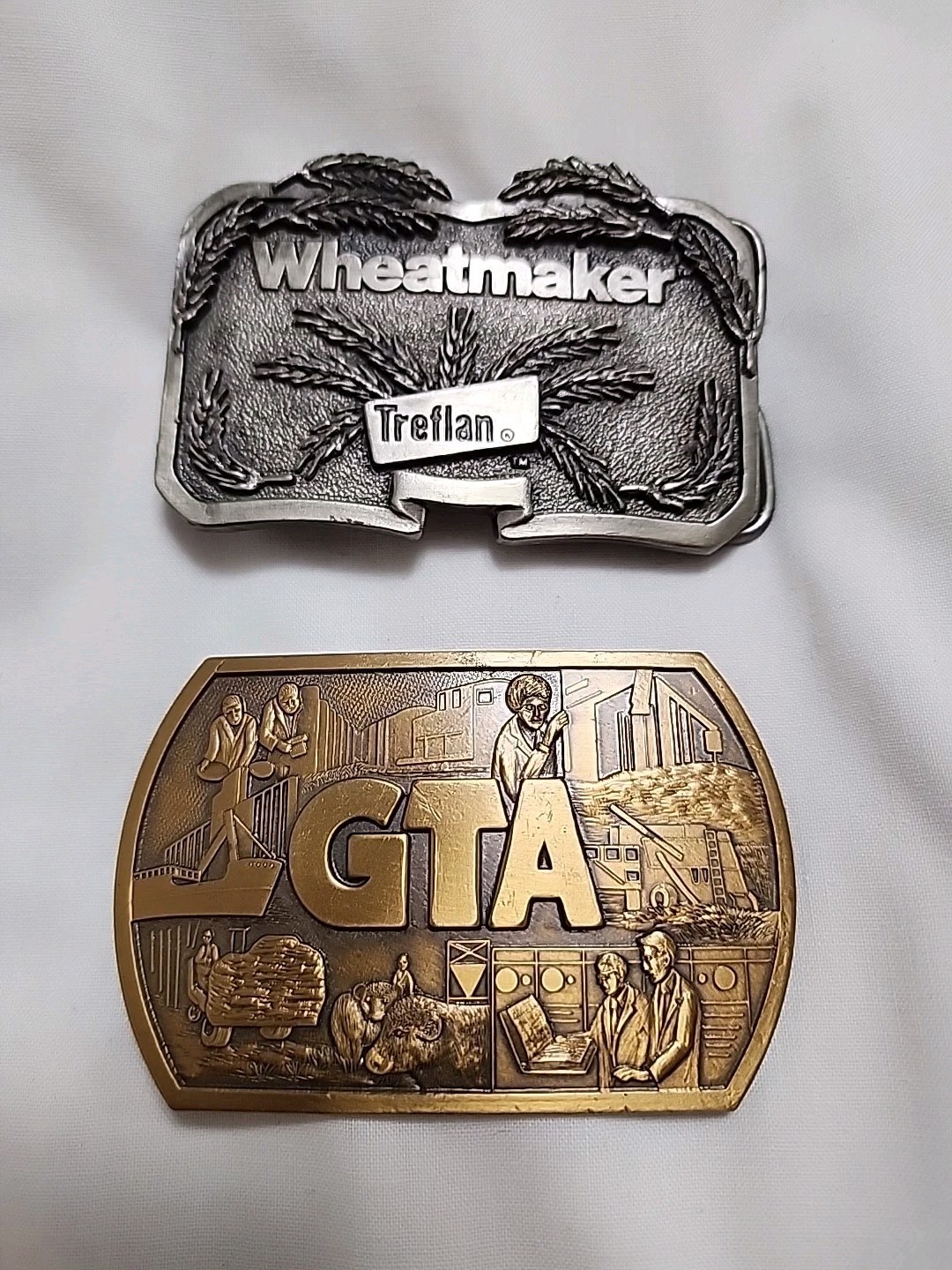 GTA & Treflan Ad Belt Buckles