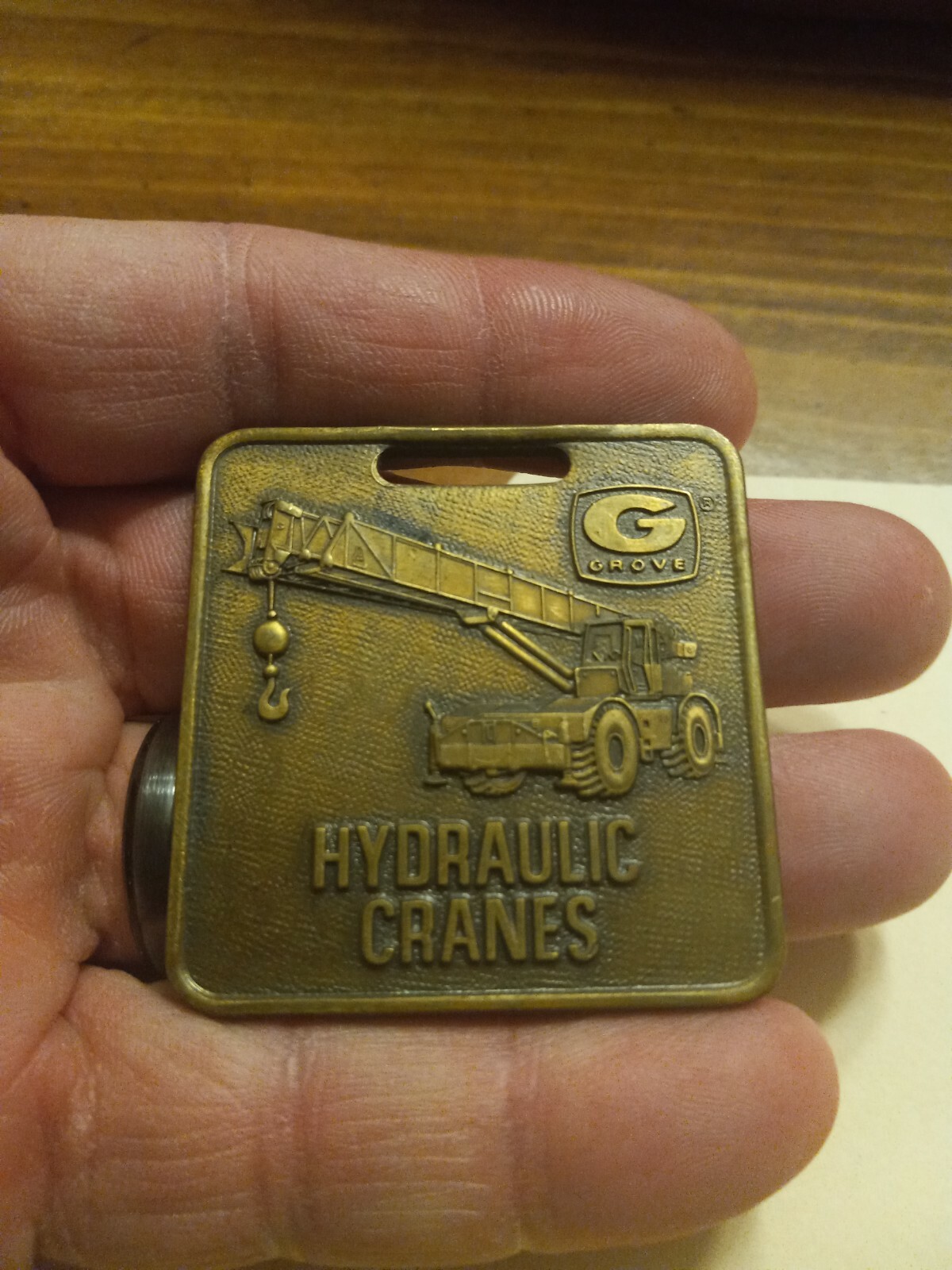 VINTAGE GROVE HYDRAULIC CRANES WATCH FOB ADVERTISING
