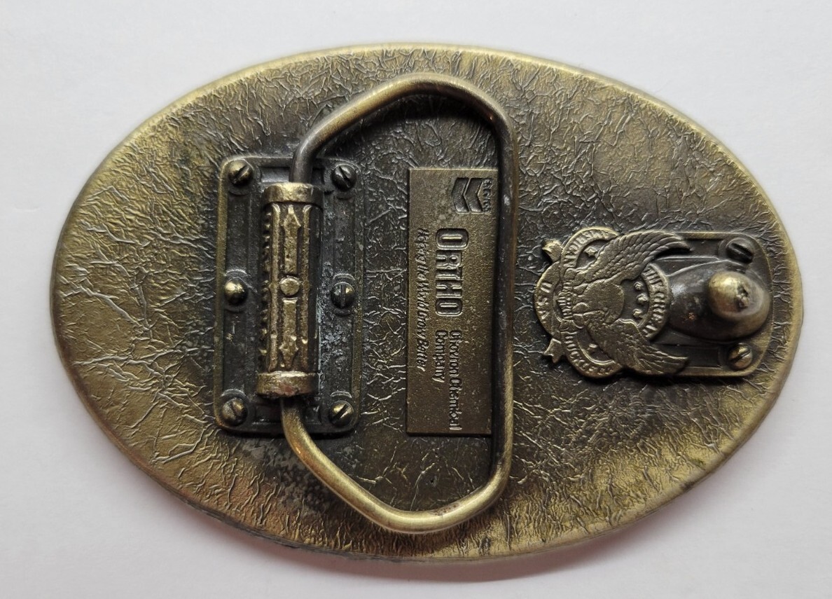 Great American Buckle Co. Ortho Chevron Chemical Company Bolero Rice Belt Buckle