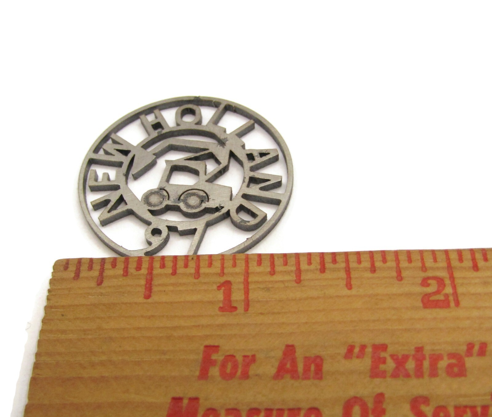 Vintage 1997 New Holland Excavator Metal Cutout Medallion Advertising Promo