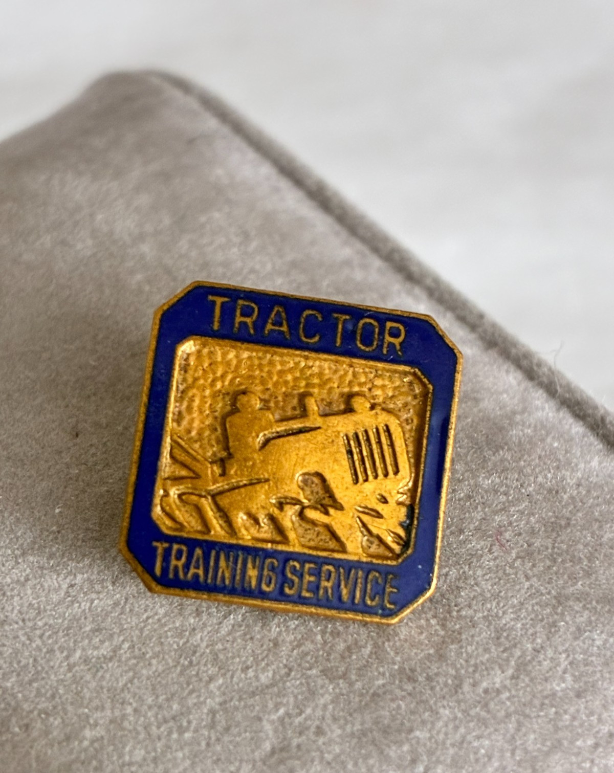 Vintage Blue Enamel and Brass TRACTOR TRAINING SERVICE Lapel Pin