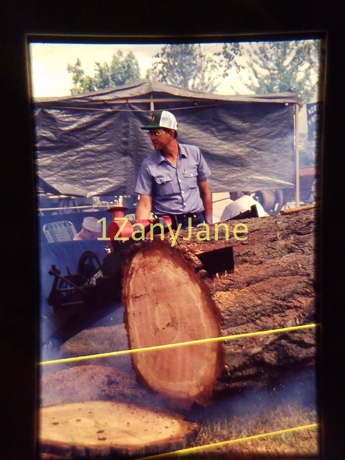 AC2411 35mm Slide of an Allis-Chalmers from MEDIA ARCHIVES SAWED OFF TREE TRUNK
