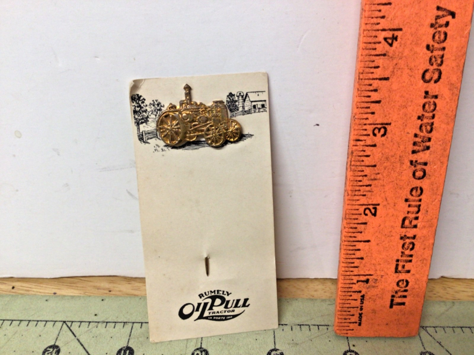 Vintage 1900’s Rumley Oil Pull tractor hat pin new on the card