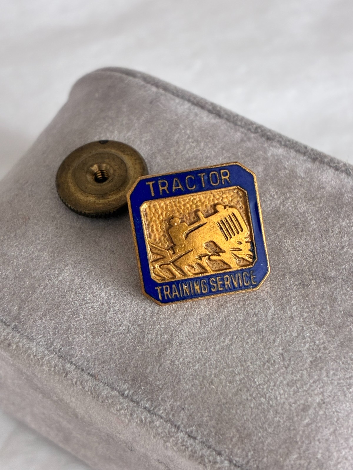 Vintage Blue Enamel and Brass TRACTOR TRAINING SERVICE Lapel Pin