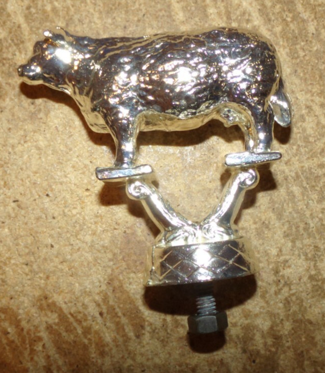 vintage heavy metal silver color shorthorn cow trophy top in nice shape used
