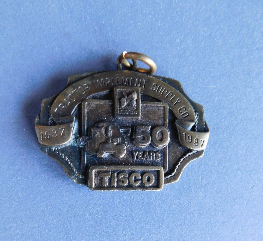 Pendant / Medallion – TISCO : 1987 50 Years : Tractor Implement Supply