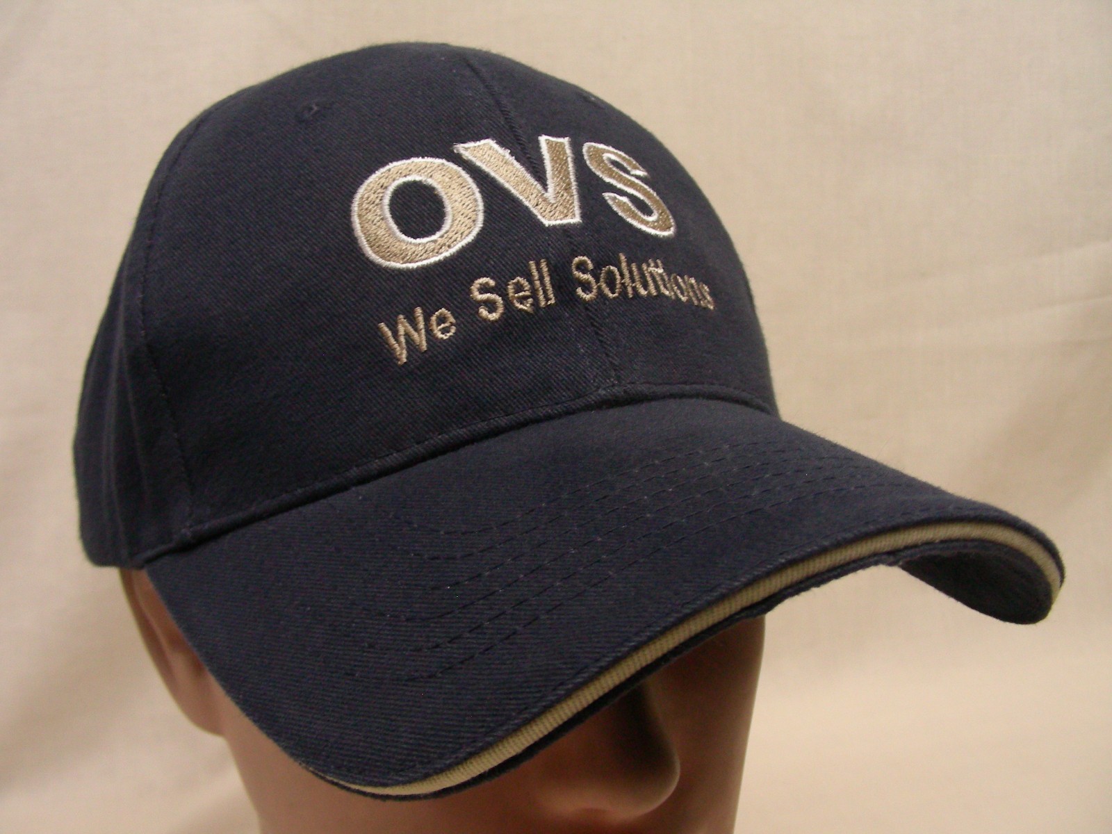OVS – WE SELL SOLUTIONS – EMBROIDERED – ADJUSTABLE BALL CAP HAT!