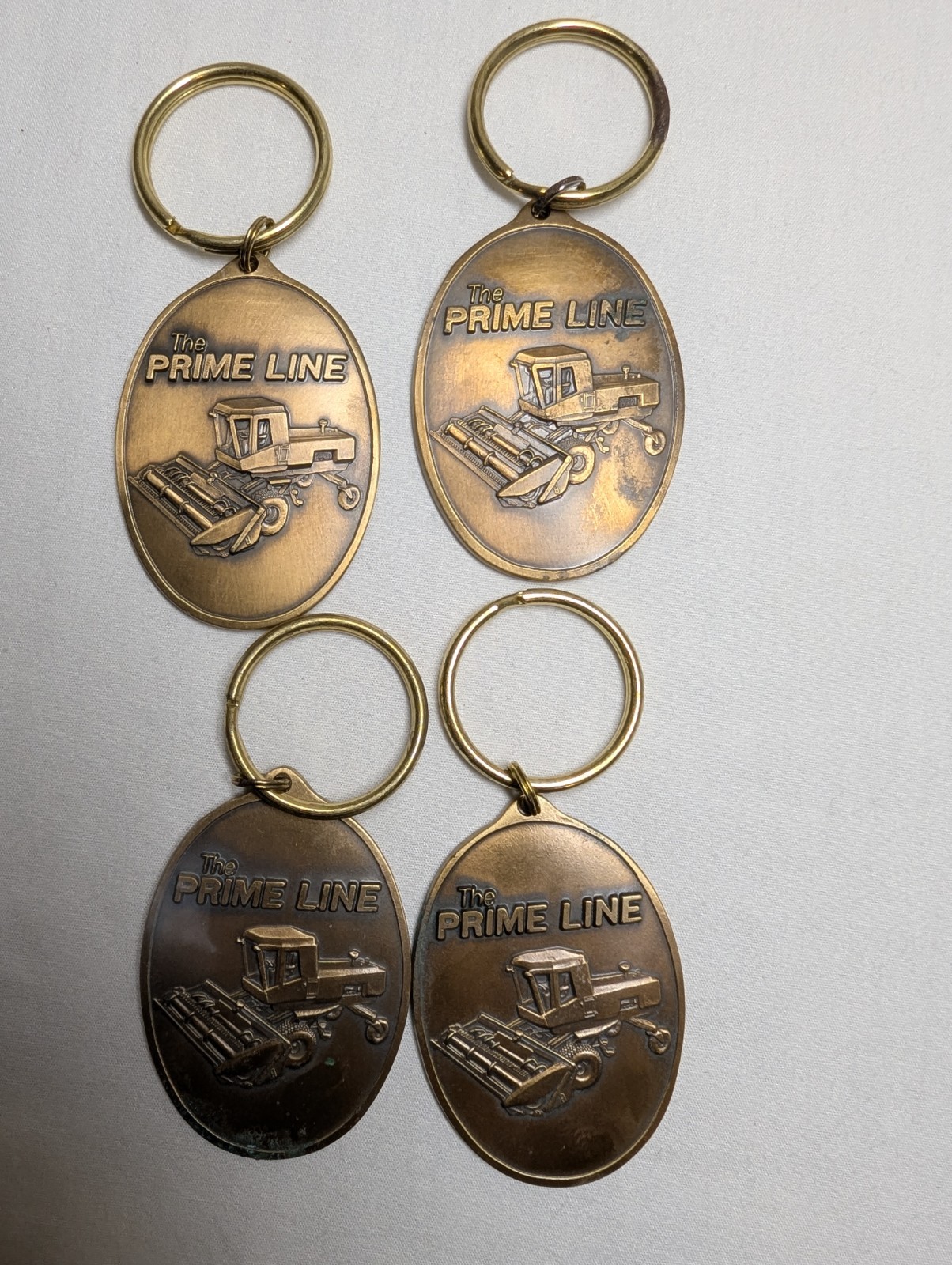 Lot of 4 Vintage 1985 Hesston The Prime Line Keychains Limited Edition Combine