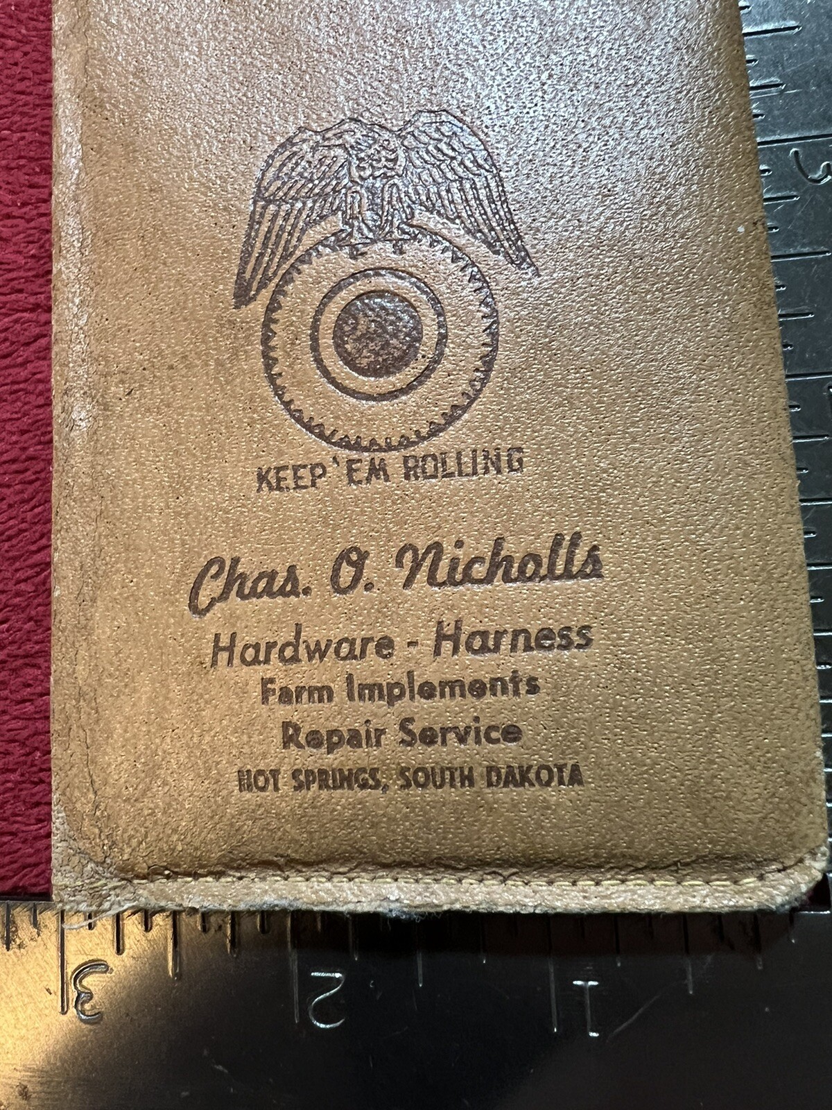 Vintage Keep’Em Rolling Wallet, Chas. O. Nichols Implement in Hot Springs, SD.