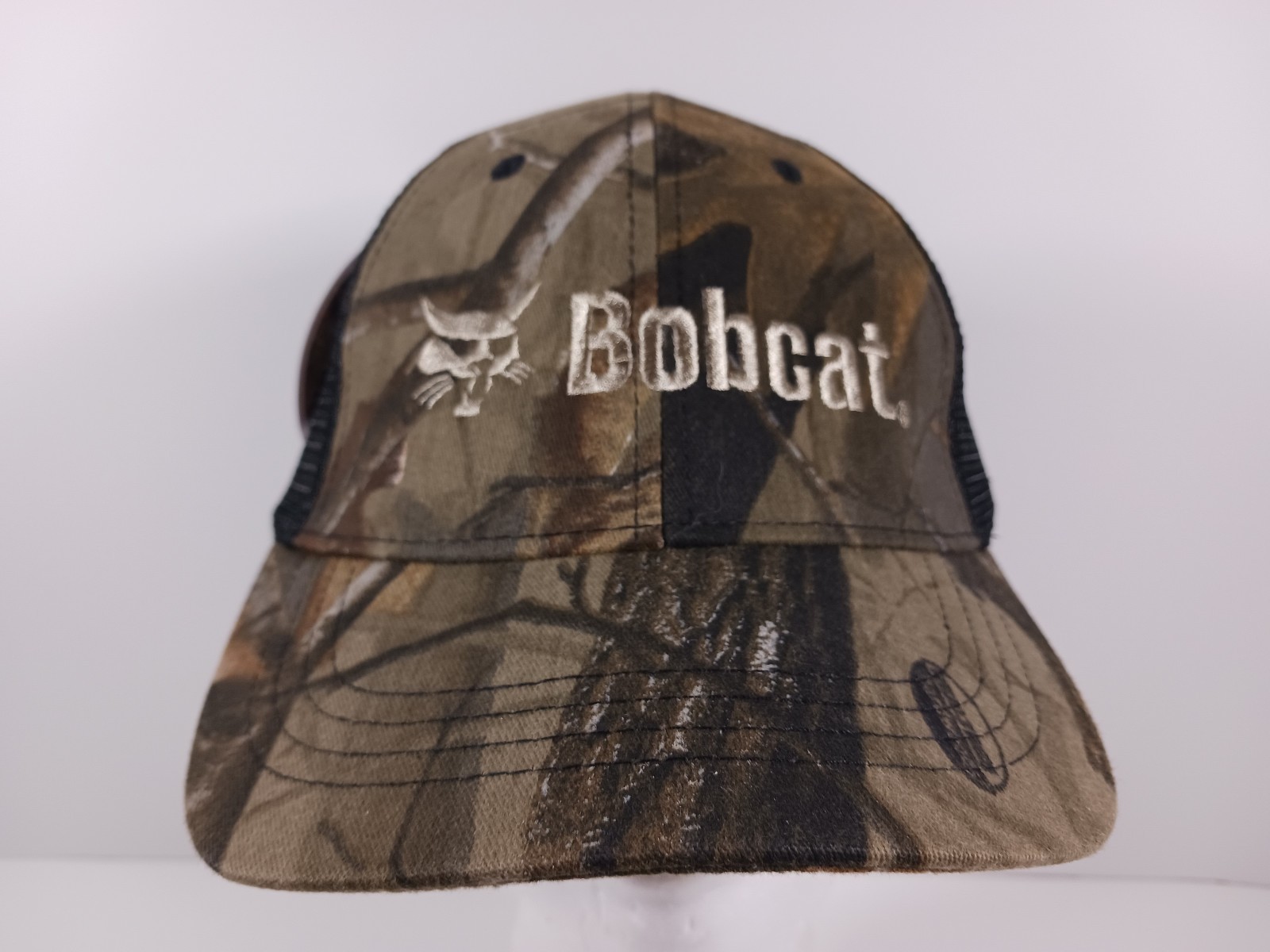 Bobcat Mesh Trucker Hat Cap RealTree Hardwoods Camouflage Camo Black – New