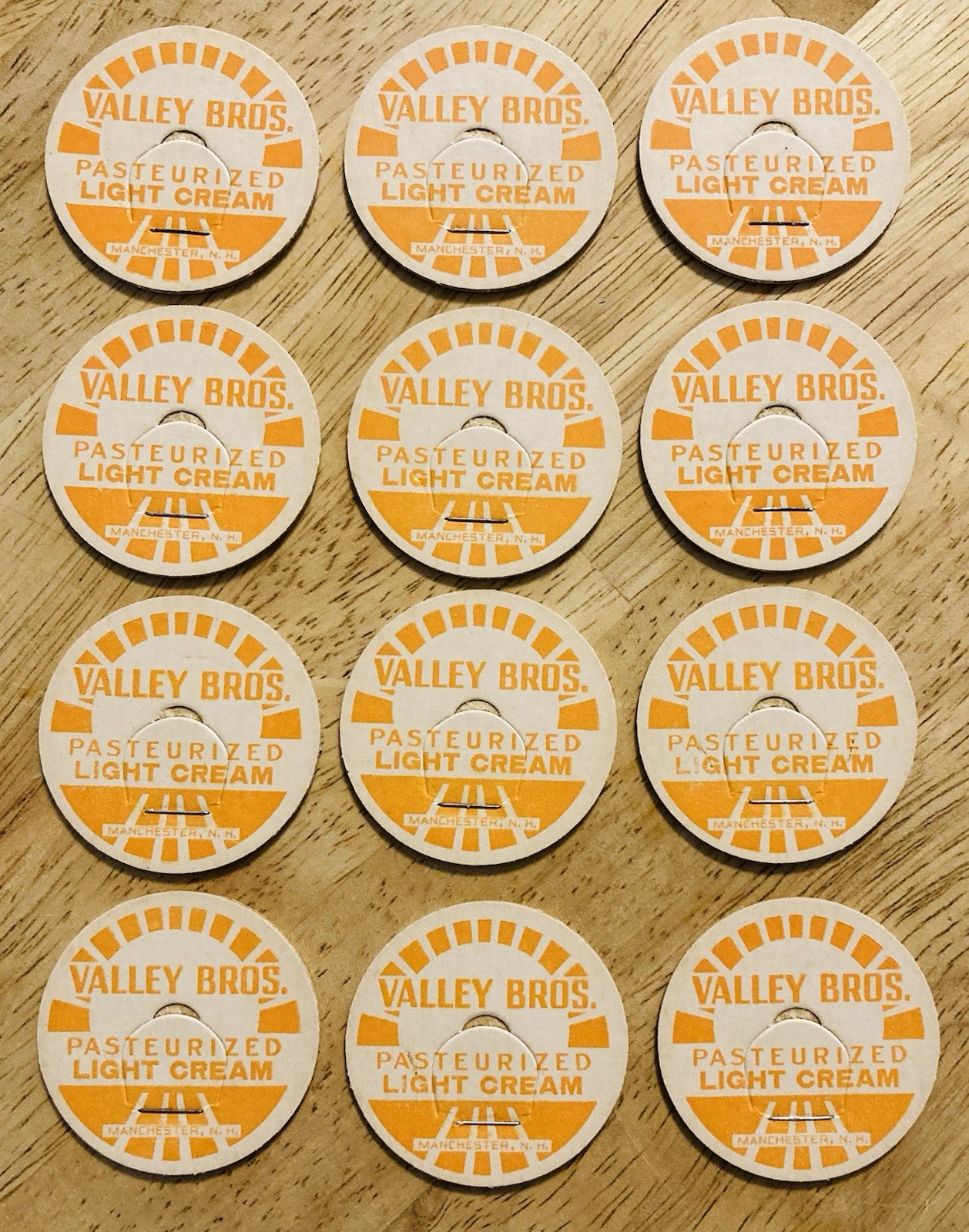 MILK BOTTLE CAP LOT OF (12)~VALLEY BROS. DAIRY FARM, MANCHESTER, NH. LIGHT CREAM