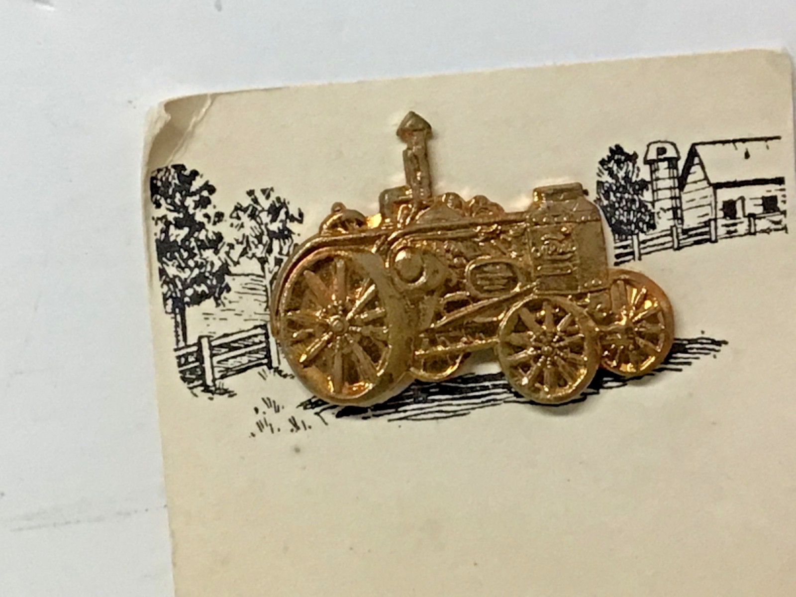 Vintage 1900’s Rumley Oil Pull tractor hat pin new on the card