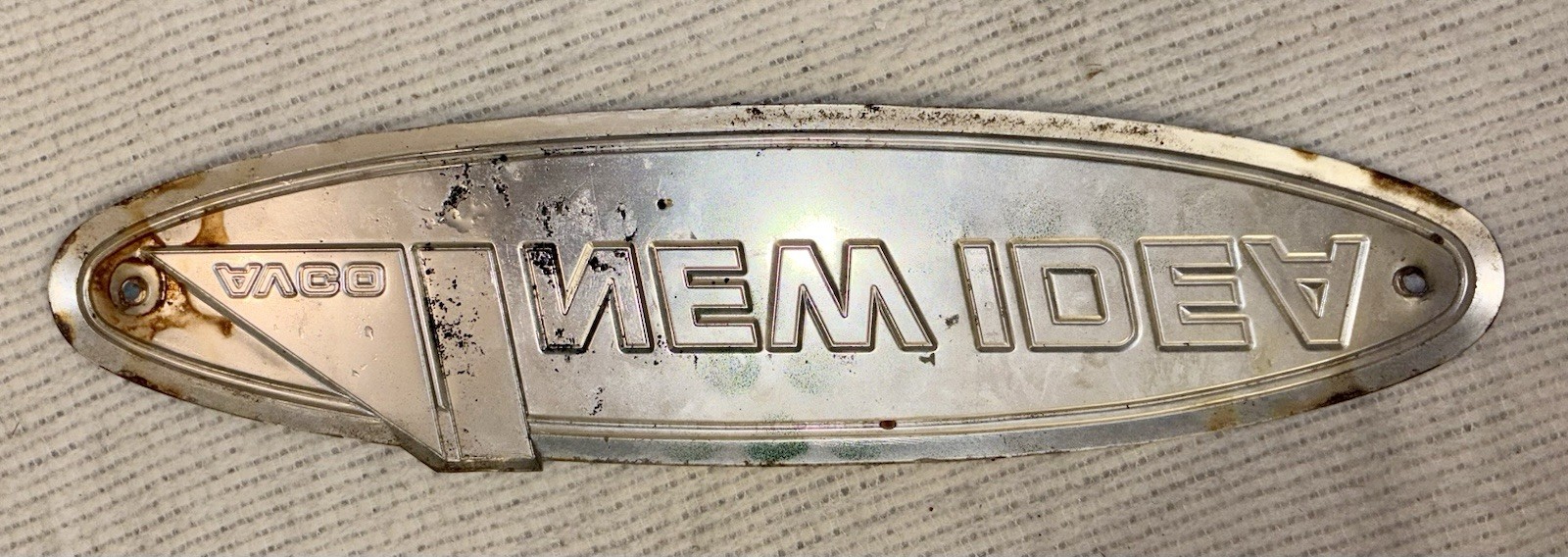 Vintage AVCO “New Idea” Sign/ Emblem 18&Prime; × 4 1/2&Prime; Fair Condition