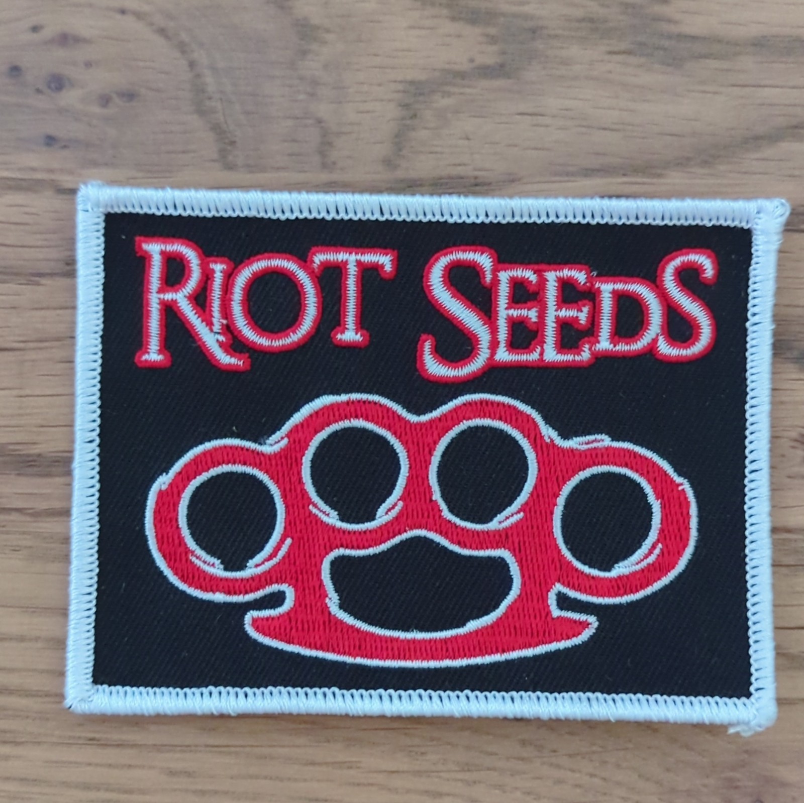 Riot Seeds Embroidered Patch Knuckle Design Agriculture Theme Black Red White