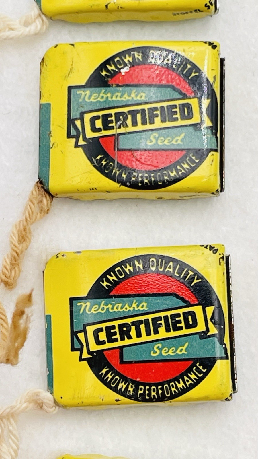 Lot 13 VTG Farm Metal Seed Bag Tag Clip NEBRASKA Crop Improvement Assoc & Idaho