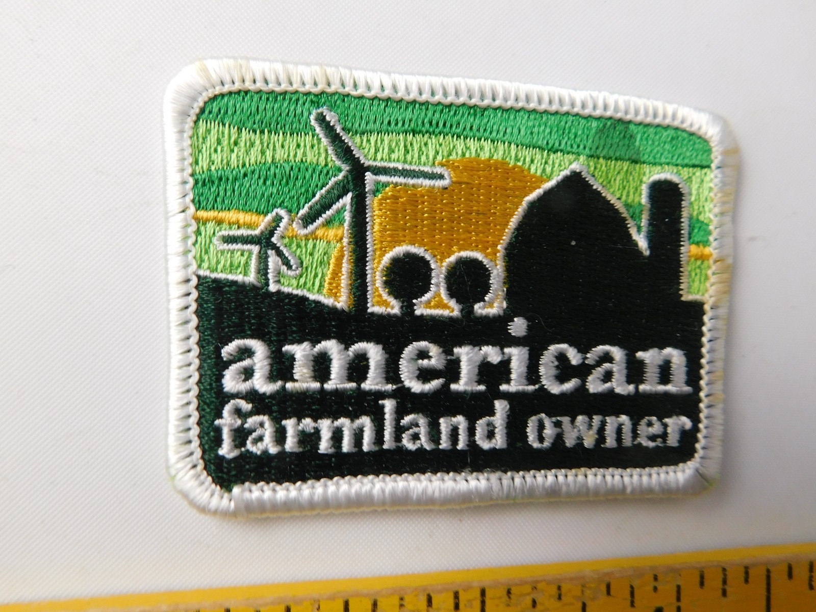 AMERICAN FARMLAND OWNER VINTAGE PATCH HAT BADGE FARM AGRICULTURE