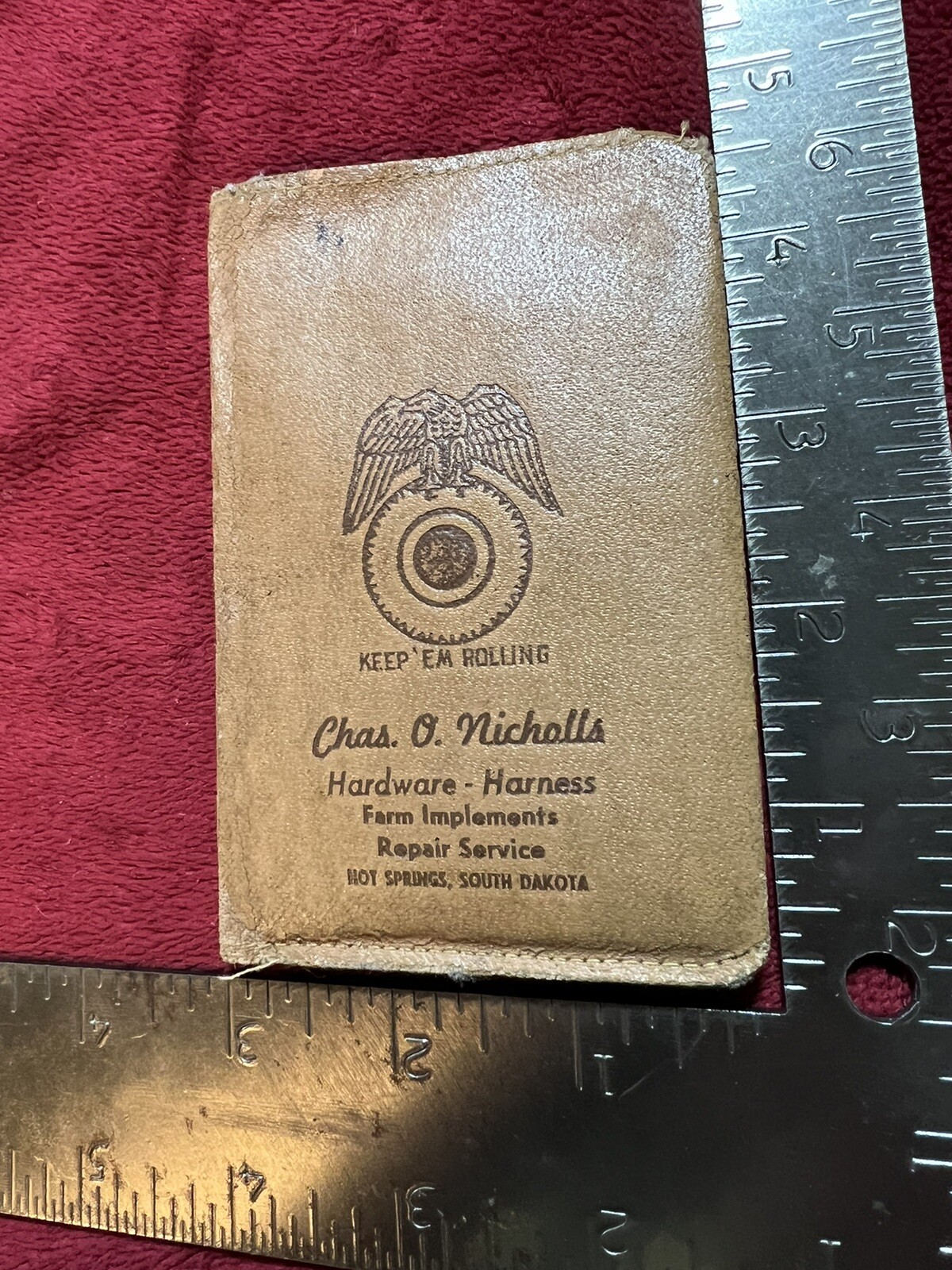 Vintage Keep’Em Rolling Wallet, Chas. O. Nichols Implement in Hot Springs, SD.
