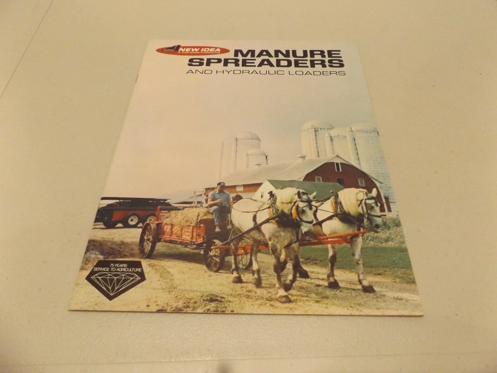 NEW IDEA MANURE SPREADERS AND HYDRAULIC LOADERS 75 YEARS, LIT. # 7440-1, 73-74