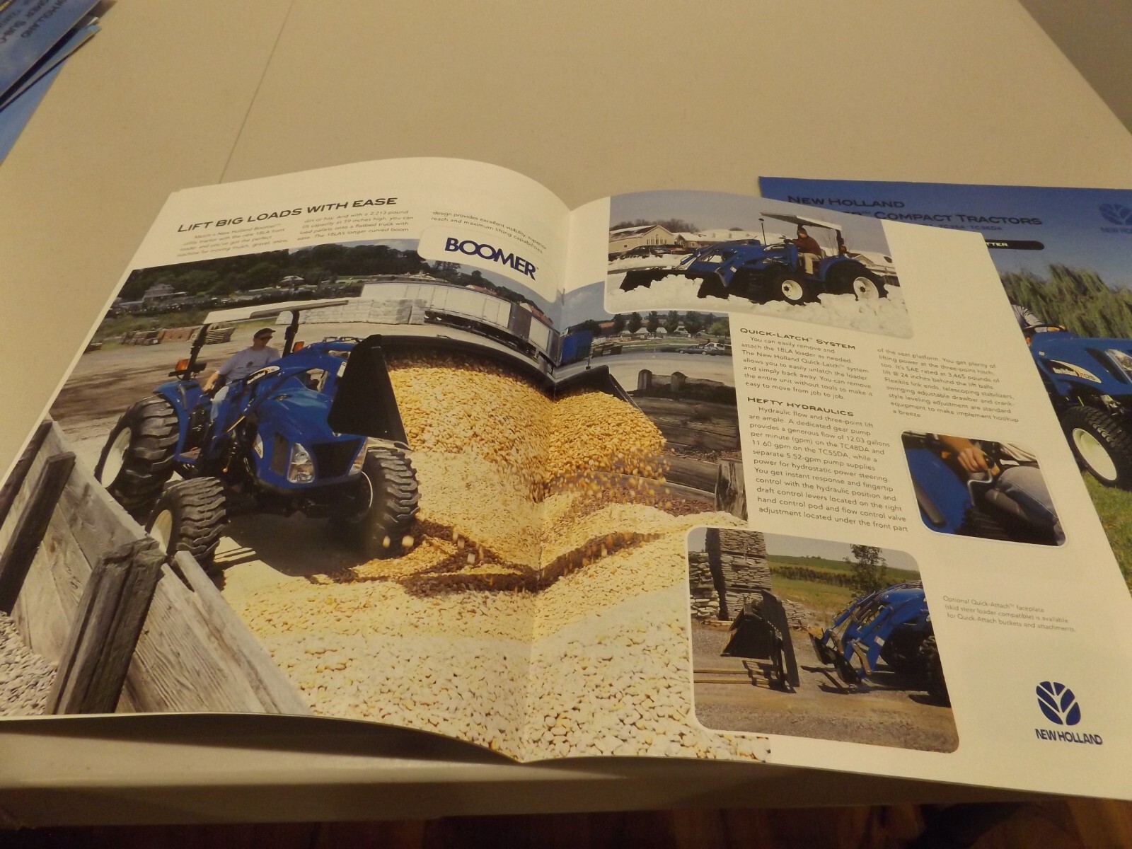 2-pc. NEW HOLLAND BOOMER UTILITY & COMPACT TRACTORS, LIT # NH1050336, NH1050349