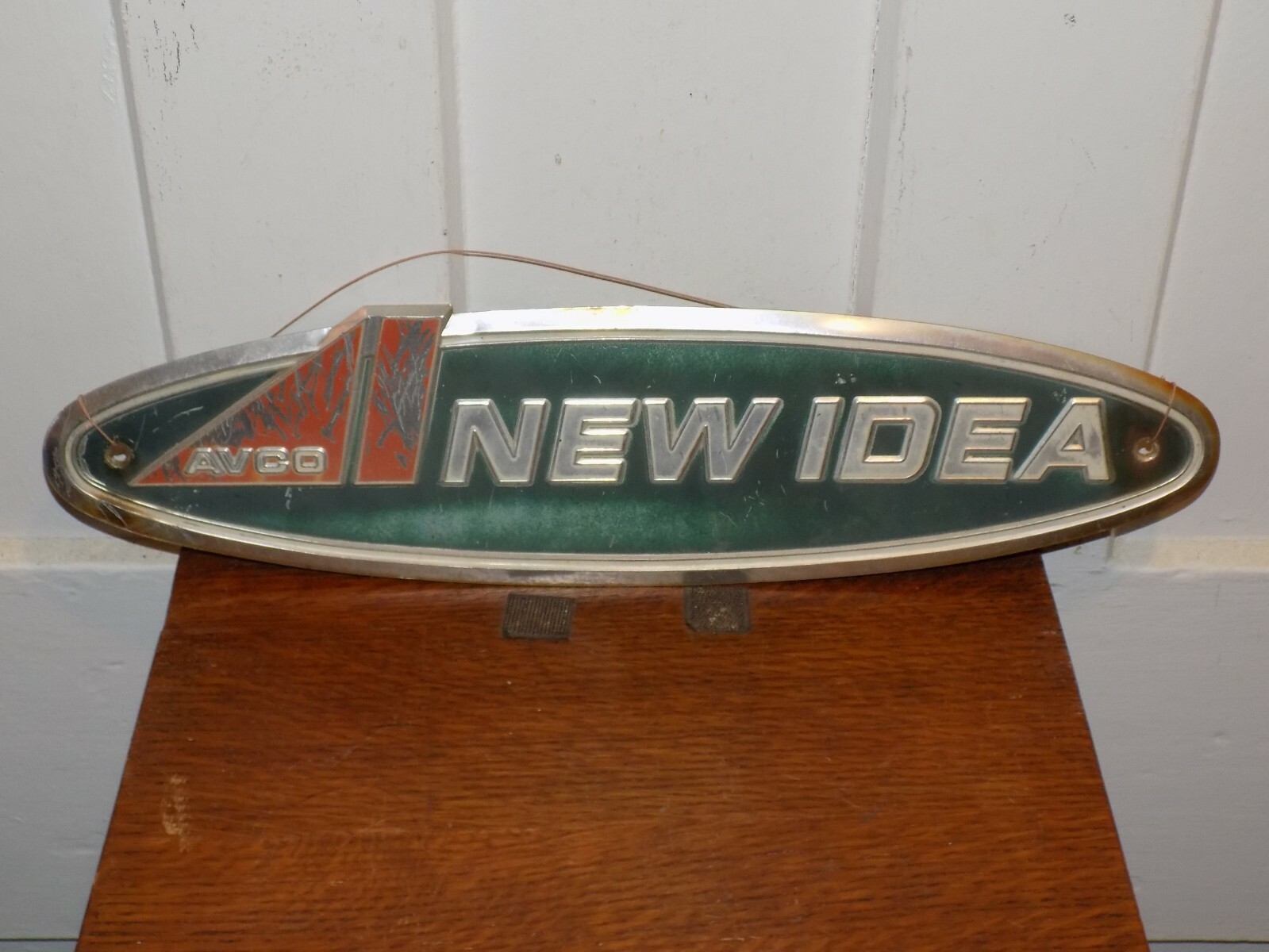 Vintage AVCO New Idea Embossed Aluminum Sign