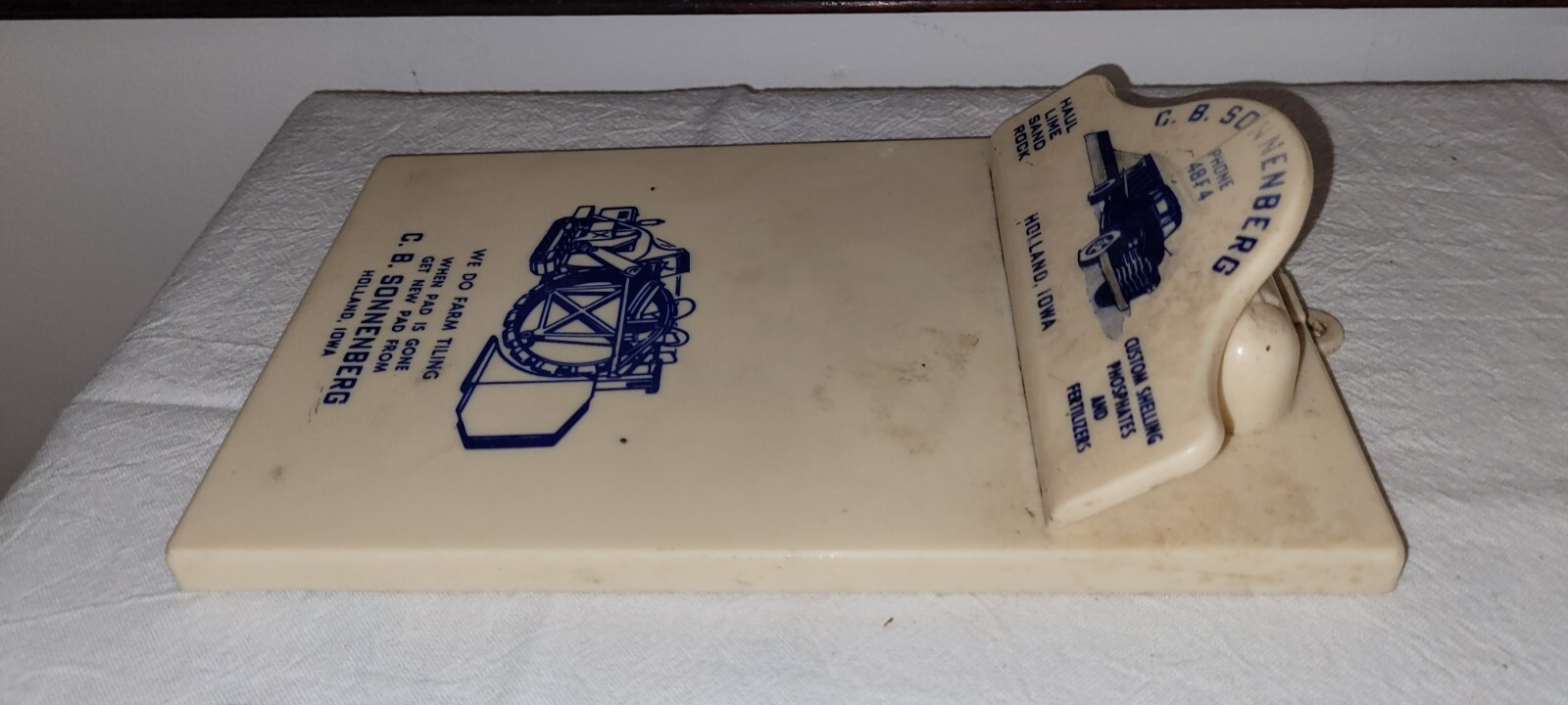 vtg C.B. SONNENBERG Trucking & Tiling HOLLAND IOWA Clip Board Plastic 1940&rsquo;s