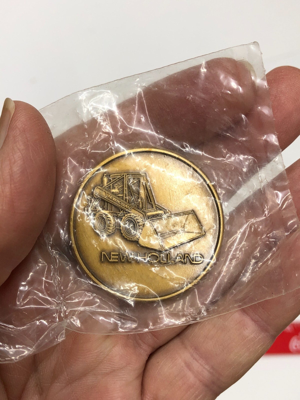 New Holland Earn A Bucket of Dollars 1983 Advertising Coin