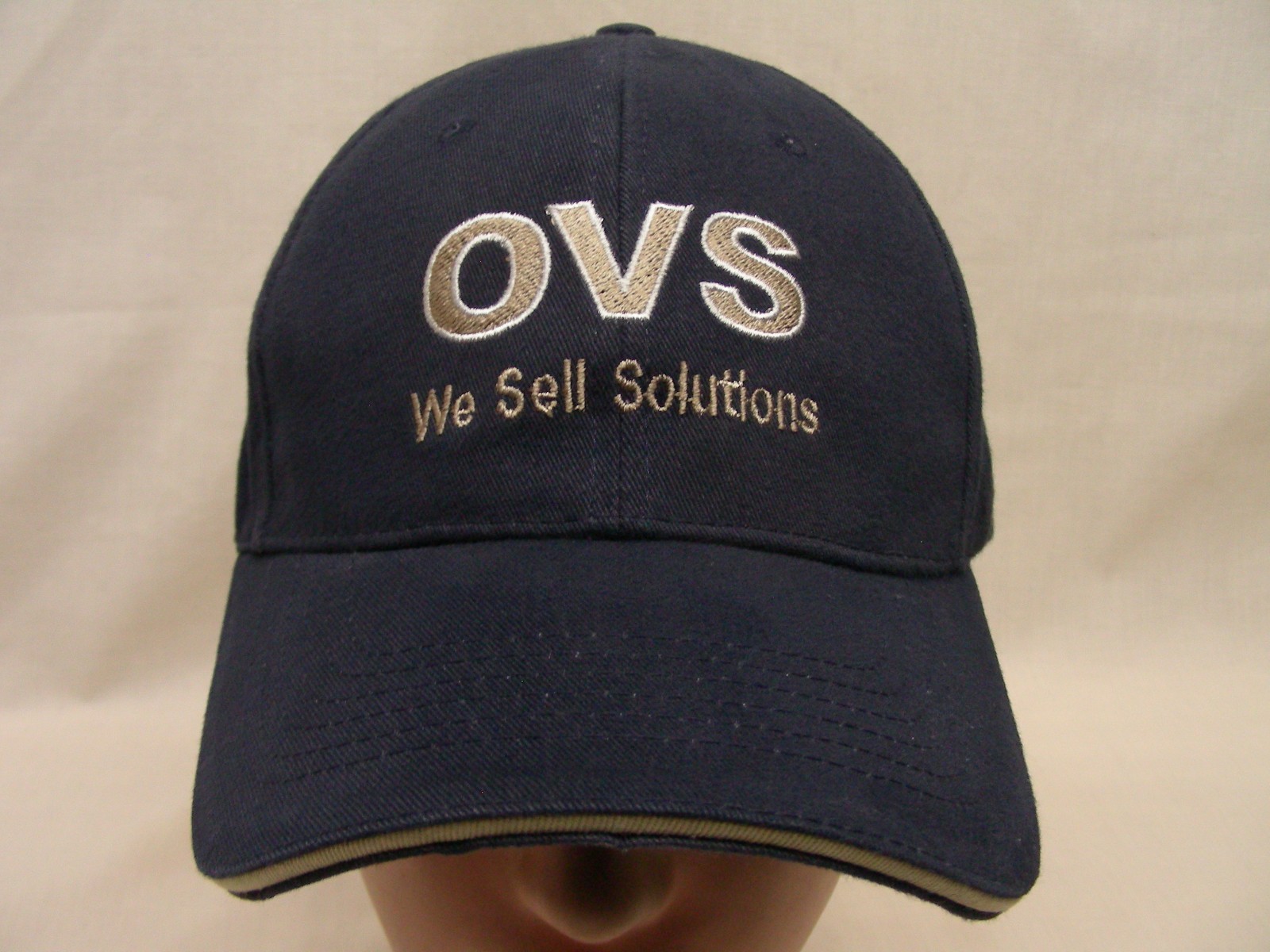 OVS – WE SELL SOLUTIONS – EMBROIDERED – ADJUSTABLE BALL CAP HAT!