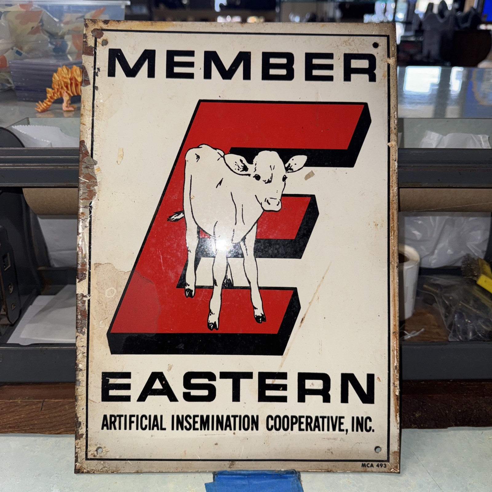 Member eastern artificial insemination cooperative painted tin sign
