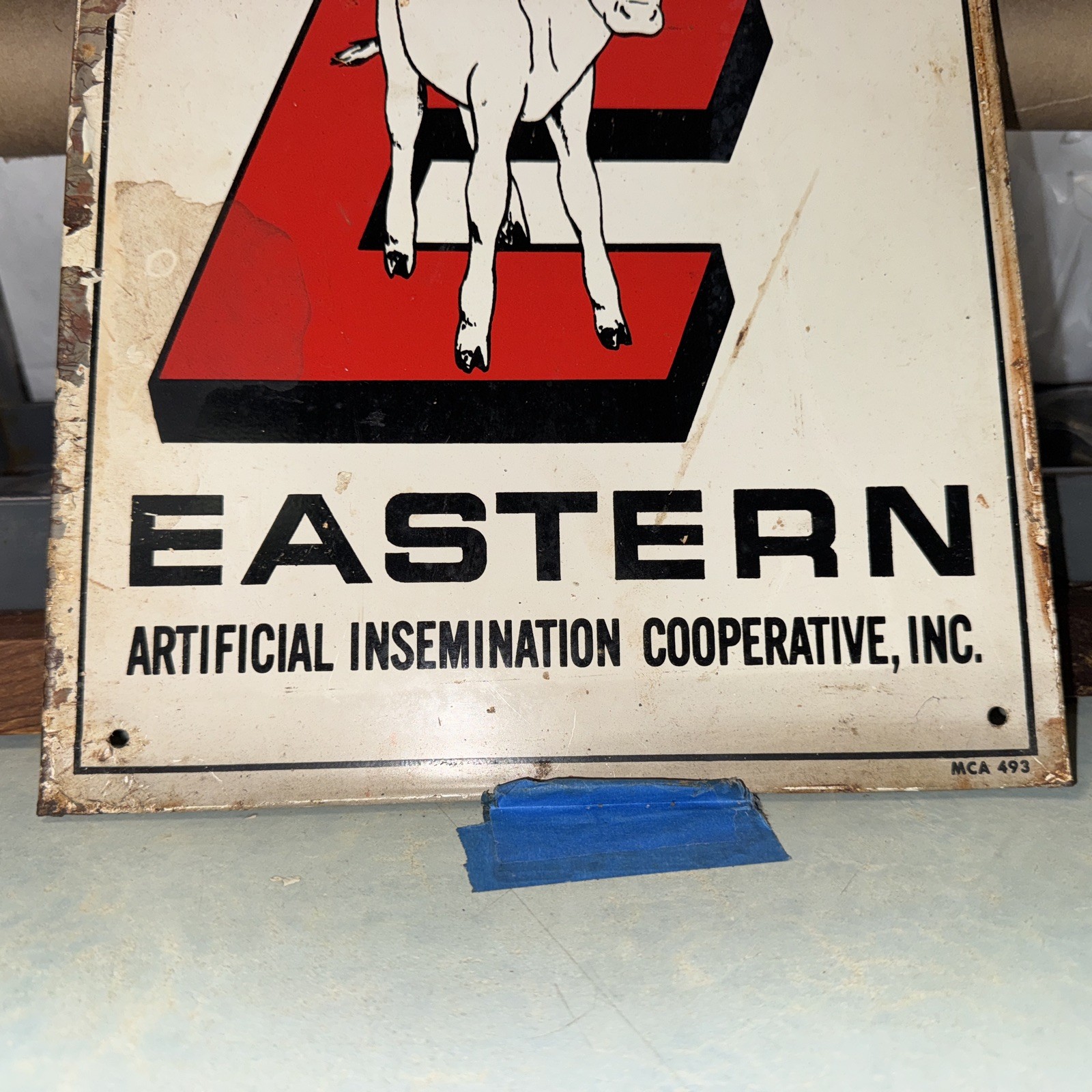 Member eastern artificial insemination cooperative painted tin sign