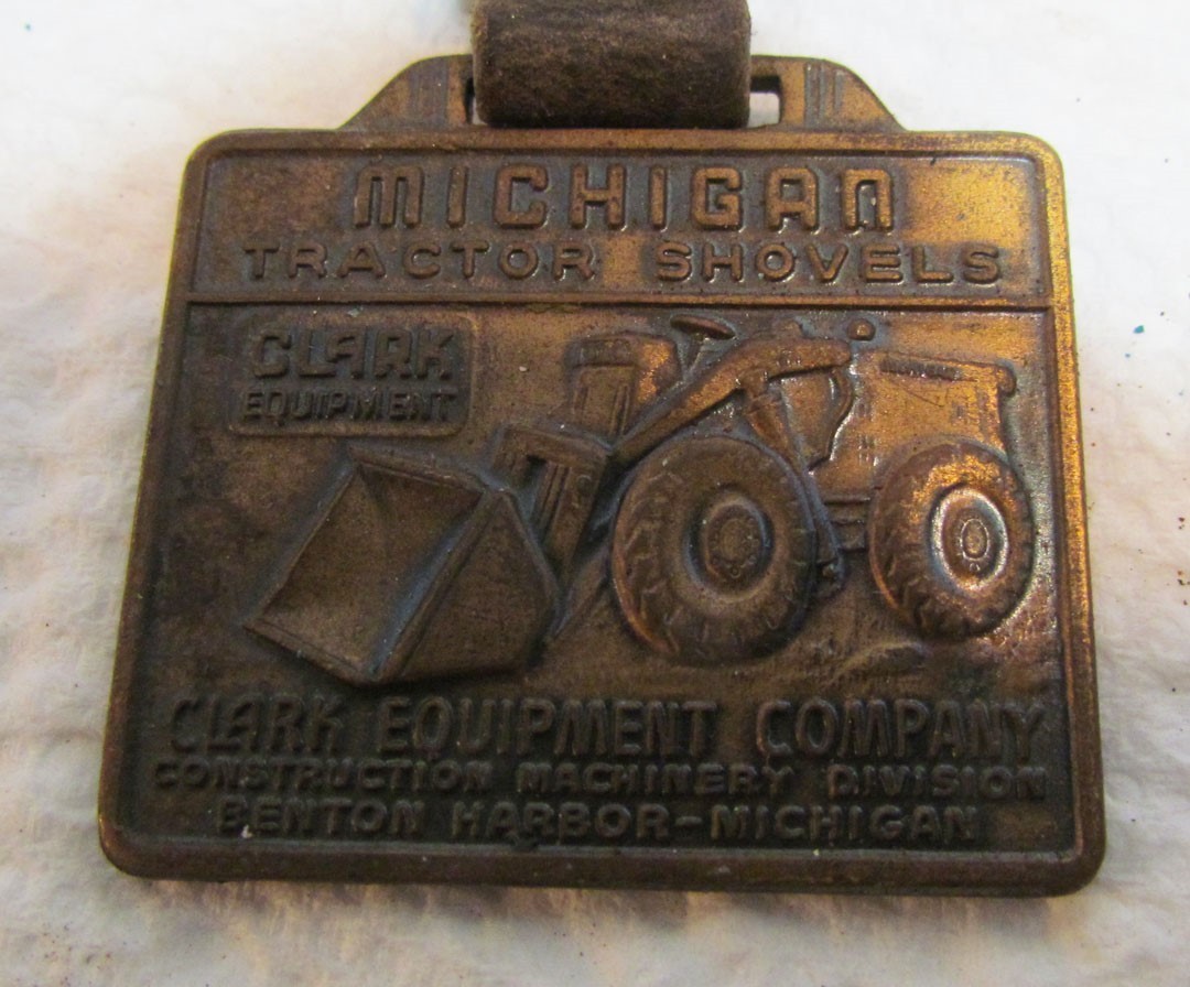 CLARK EQUIPMENT TRACTOR SHOVELS MICHIGAN METAL WATCH FOB VINTAGE ADVERTISING