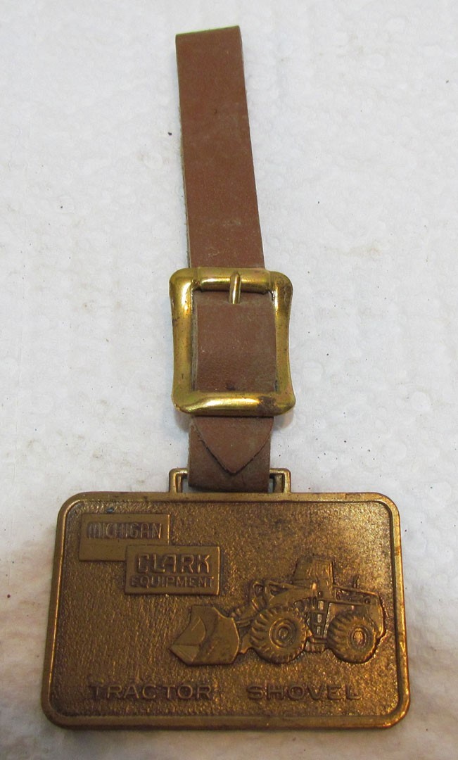 CLARK EQUIPMENT MICHIGAN TRACTOR SHOVEL METAL WATCH FOB VINTAGE ADVERTISING