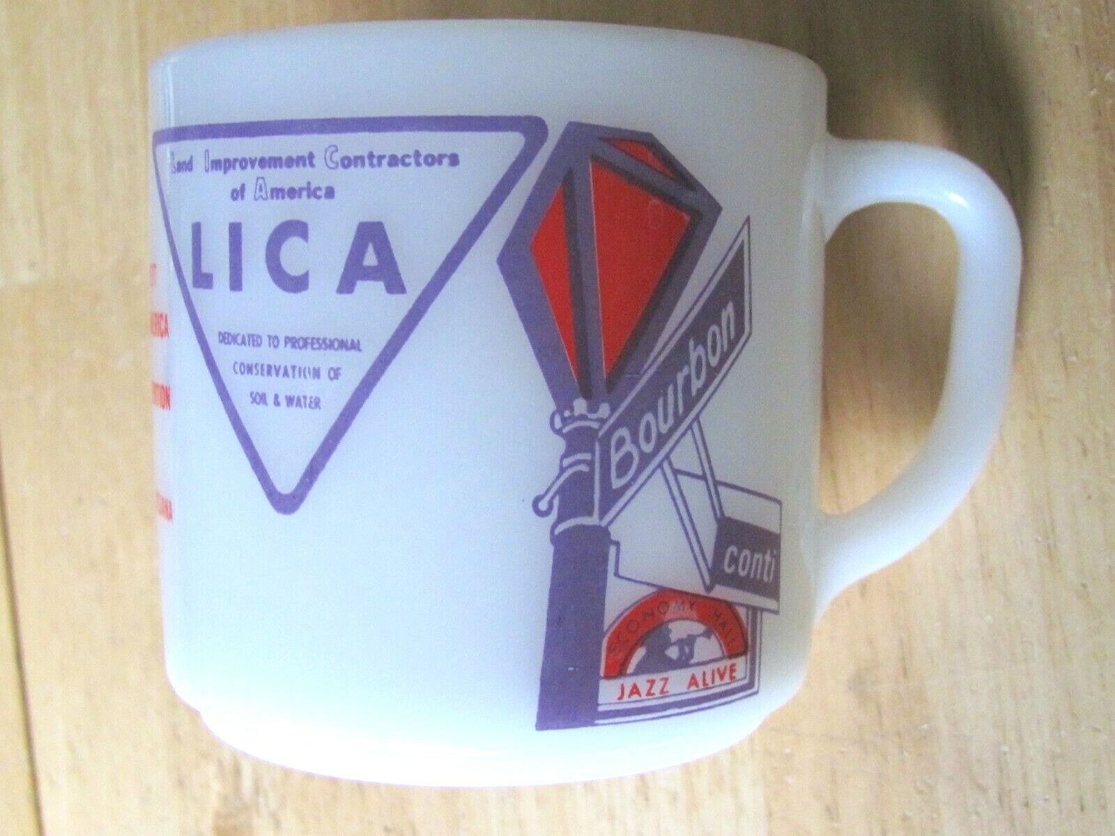1973 MILK GLASS COFFEE CUP NEW ORLEANS LICA LAND IMPROVEMENT CONTRACTORS FARM