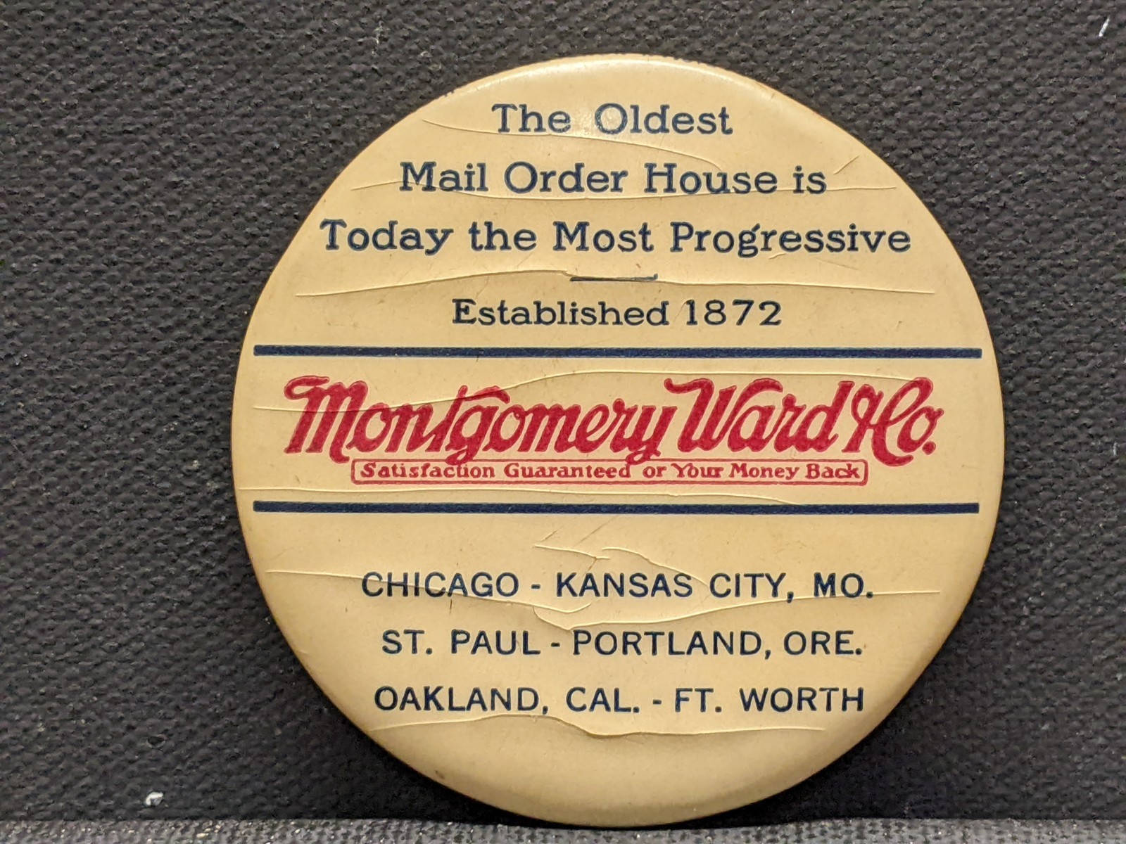Montgomery Ward Celluloid advertising button style knife sharpener