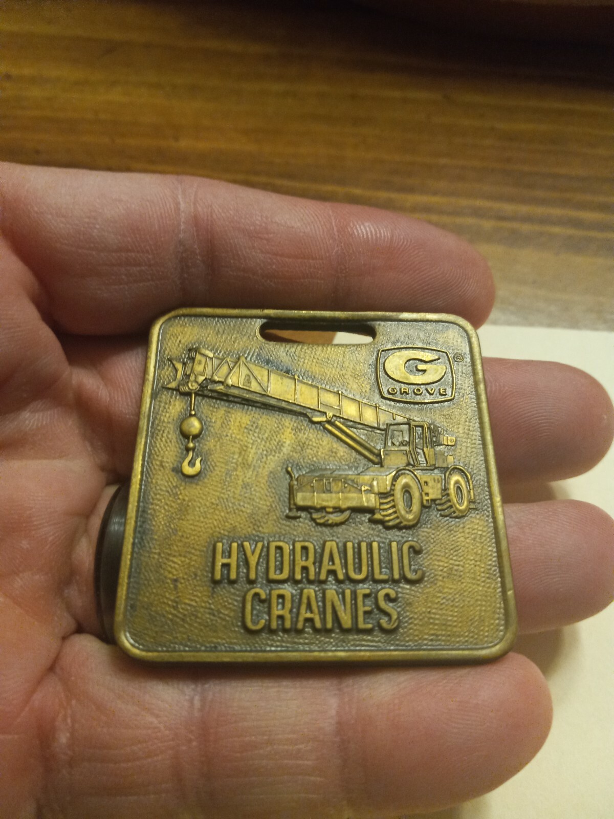 VINTAGE GROVE HYDRAULIC CRANES WATCH FOB ADVERTISING