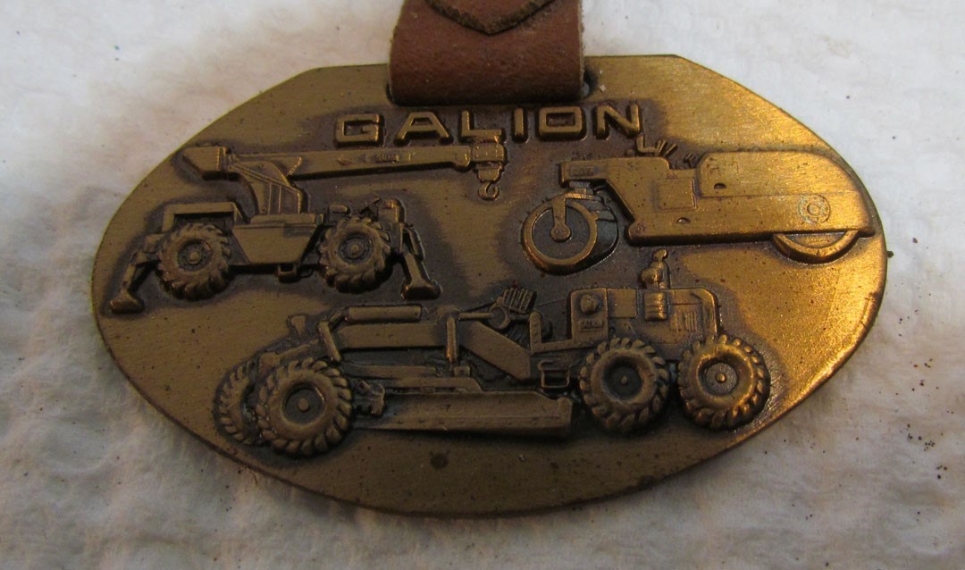 GALION HEAVY CONSTRUCTION EQUIPMENT METAL WATCH FOB VINTAGE ADVERTISING