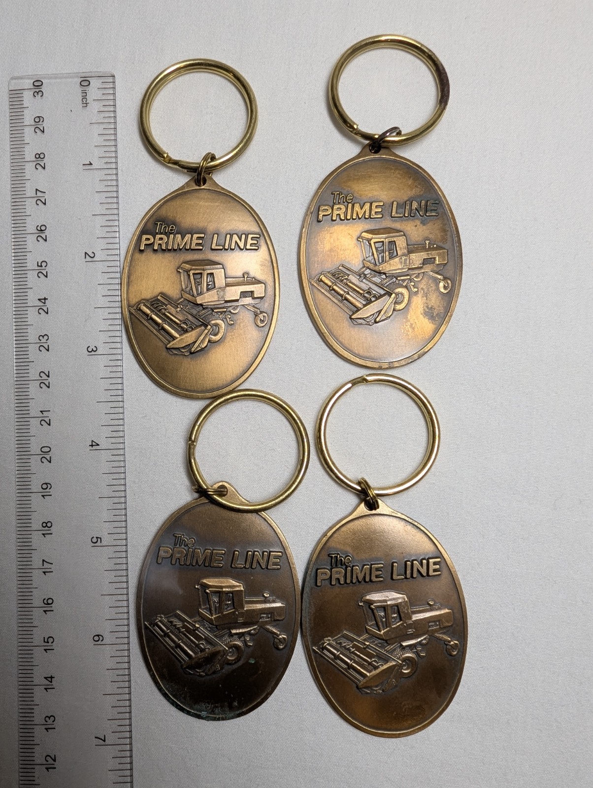 Lot of 4 Vintage 1985 Hesston The Prime Line Keychains Limited Edition Combine