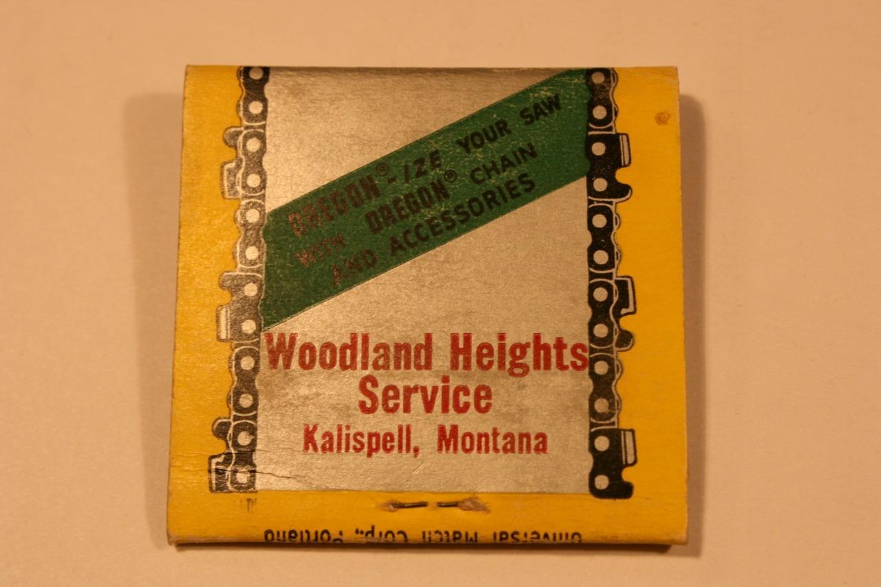 KALISPELL, MONTANA ~ WOODLAND HEIGHTS CHAINSAWS Matchbook advertising OREGON