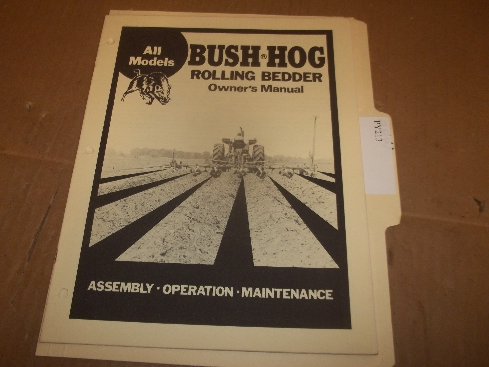PY213) Bush Hog Operator Rolling Bedder