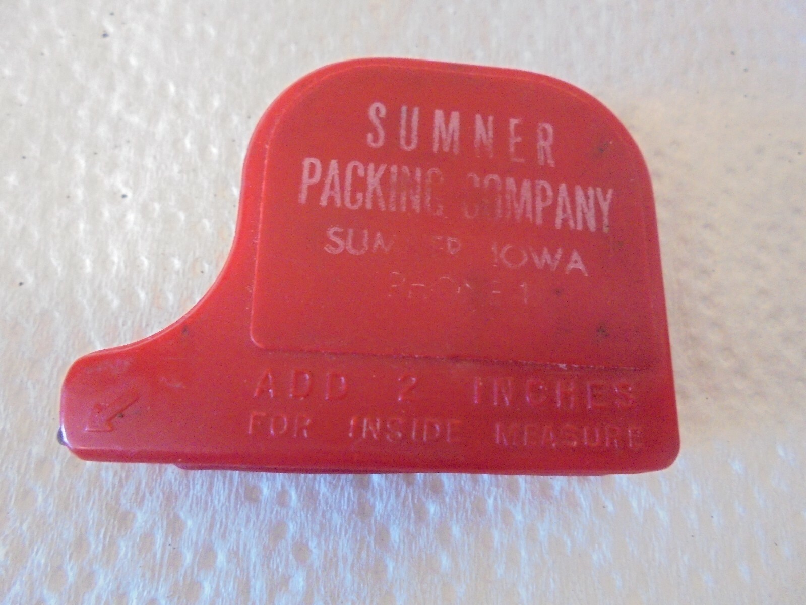 red plastic tape measure sumner packing company sumner iowa