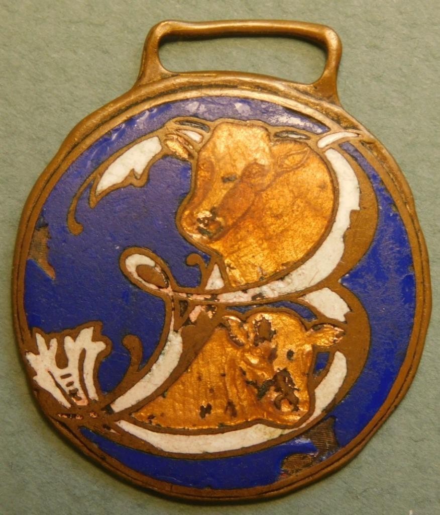 Blain Livestock Commission Grand Island NE Porcelain Watch Fob Sh.1A-2-6-#98