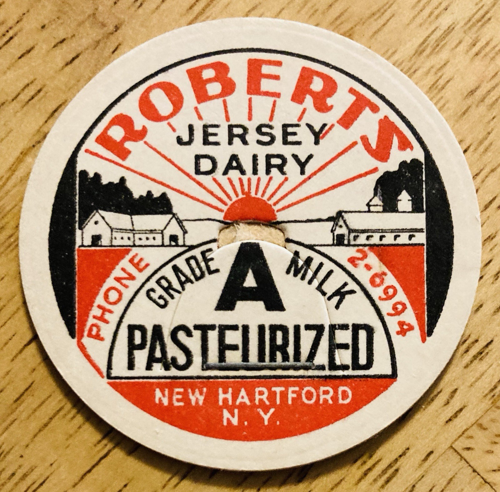 MILK BOTTLE CAP~ROBERTS JERSEY DAIRY FARM, NEW HARTFORD, NY.