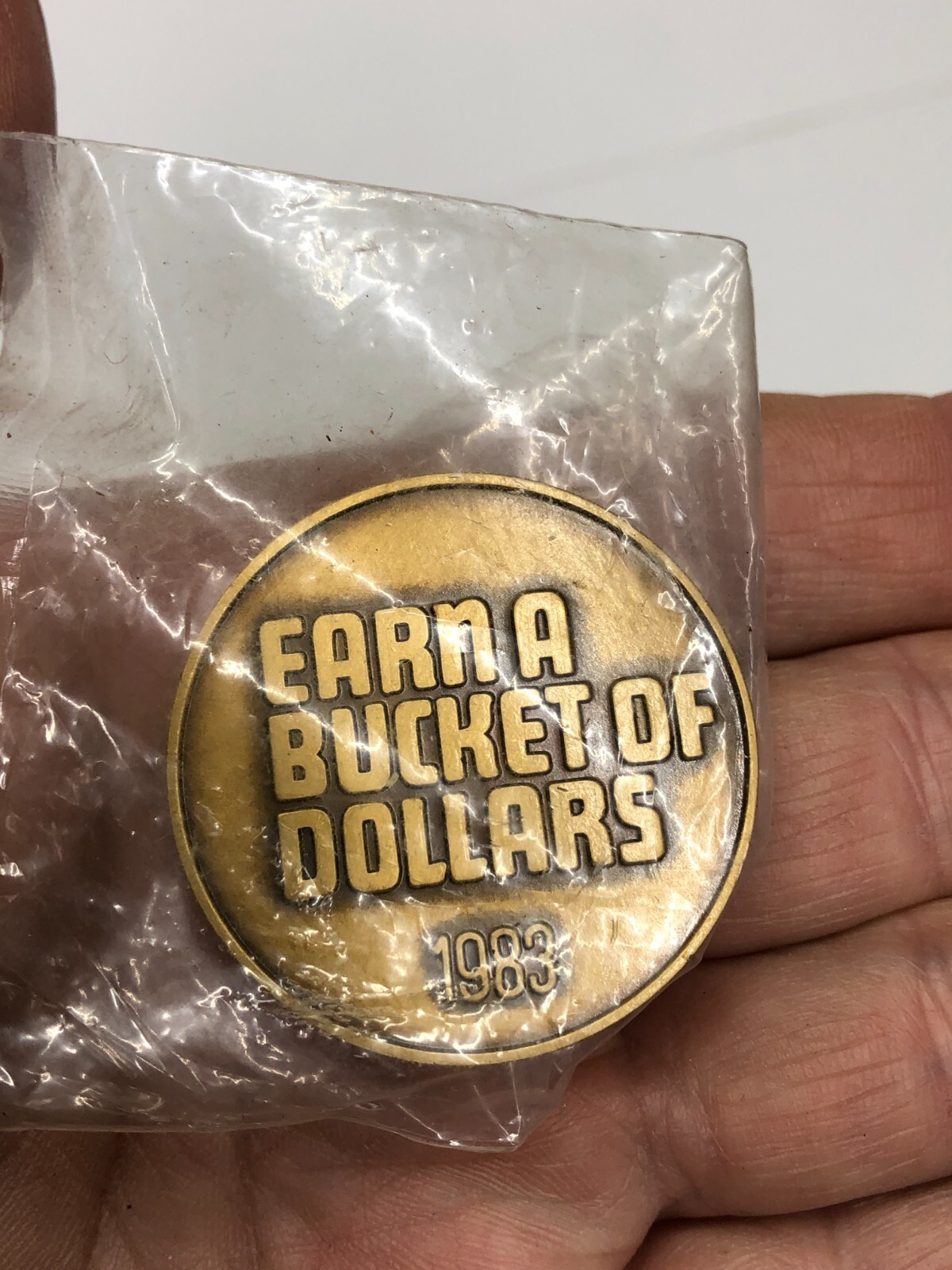 New Holland Earn A Bucket of Dollars 1983 Advertising Coin